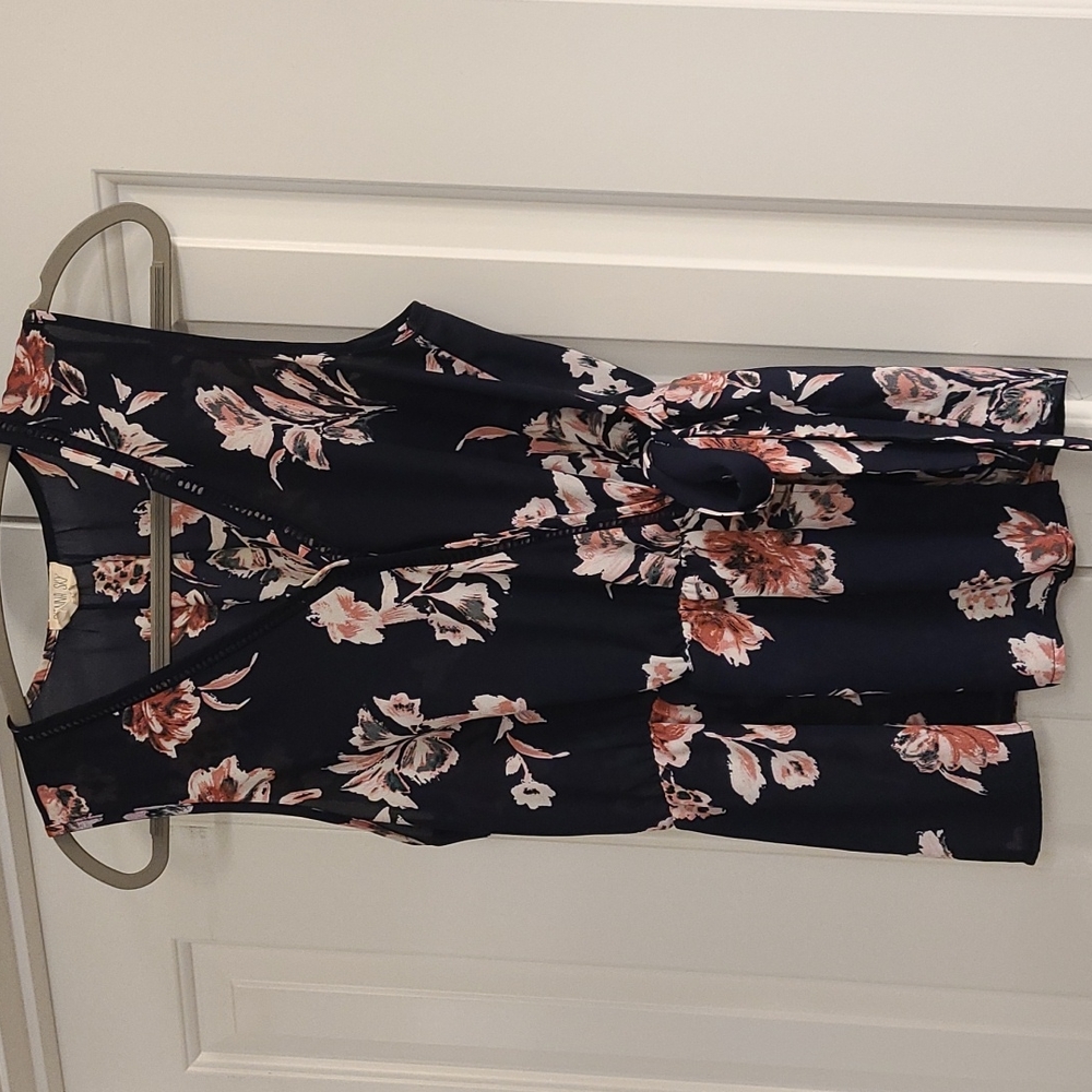 Navy floral peplum tank top